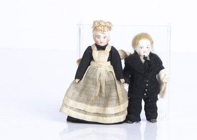 Lot 878 - Two small all-bisque dolls’ house dolls
