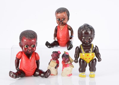 Lot 911 - Japanese celluloid black dolls and figures