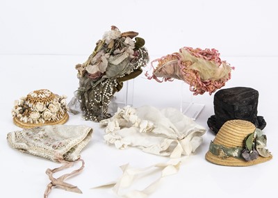 Lot 940 - Seven doll’s hats and bonnets