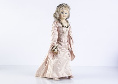Lot 942 - A German wax over composition shoulder head doll in Medieval costume