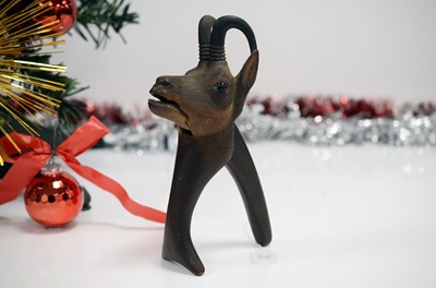 Lot 38 - A late 19th or early 20th century novelty Black Forest carved wooden nut cracker
