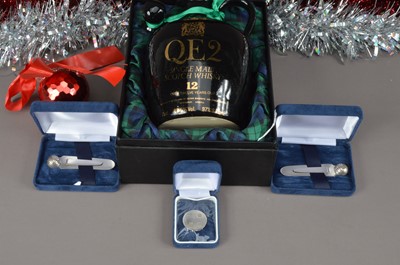 Lot 127 - A bottle of whiksy and three silver gold related items