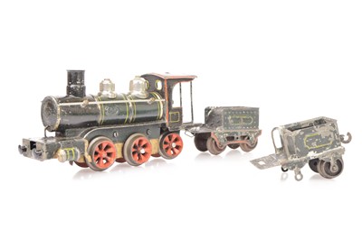 Lot 153 - A very early and uncommon Marklin 0 Gauge clockwork 0-4-2 Locomotive and two Tenders (3)