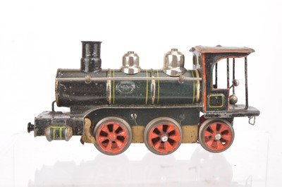Lot 153 - A very early and uncommon Marklin 0 Gauge clockwork 0-4-2 Locomotive and two Tenders (3)