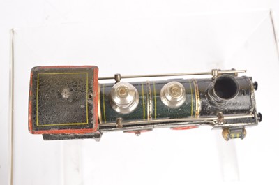 Lot 153 - A very early and uncommon Marklin 0 Gauge clockwork 0-4-2 Locomotive and two Tenders (3)