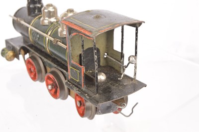Lot 153 - A very early and uncommon Marklin 0 Gauge clockwork 0-4-2 Locomotive and two Tenders (3)