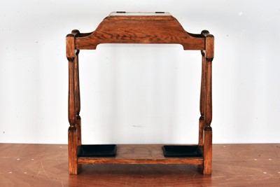 Lot 126 - An early to mid 20th century oak stick stand