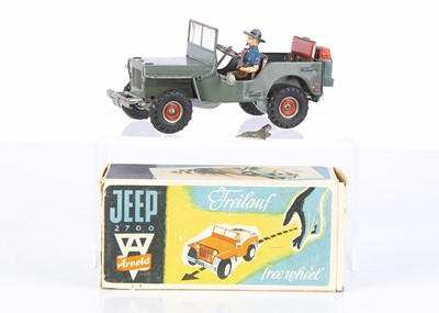 Lot 75 - An Arnold Tinplate Clockwork Civilian Jeep 2700