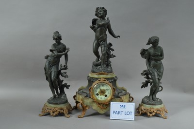 Lot 154 - A clock garniture