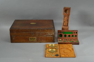 Lot 214 - A late 19th century oak cutlery box