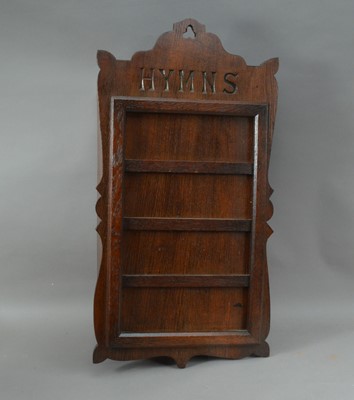 Lot 218 - An early to mid oak Church Hymn display cupboard