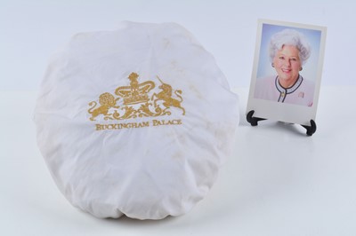 Lot 81 - A Buckingham Palace shower cap