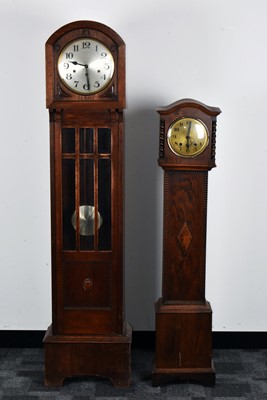 Lot 229 - Two 20th century oak cased grandmother clocks