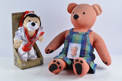 Lot 96 - A red cloth teddy bear