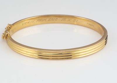 Lot 42 - A continental yellow metal bangle