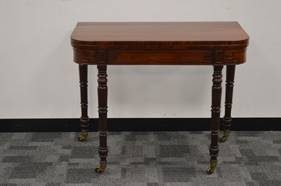 Lot 25 - An early 20th century mahogany card/games table