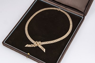Lot 94 - A 9ct gold Hamilton Laidlaw boxed diamond bow necklace