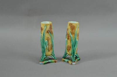 Lot 253 - A pair of 19th century Wedgwood Majolica small vases