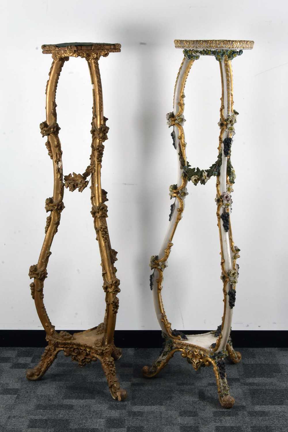 Lot 30 - A near pair of late 19th century wood and gesso open-work torchiers