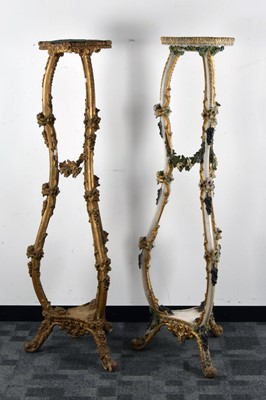 Lot 30 - A near pair of late 19th century wood and gesso open-work torchiers