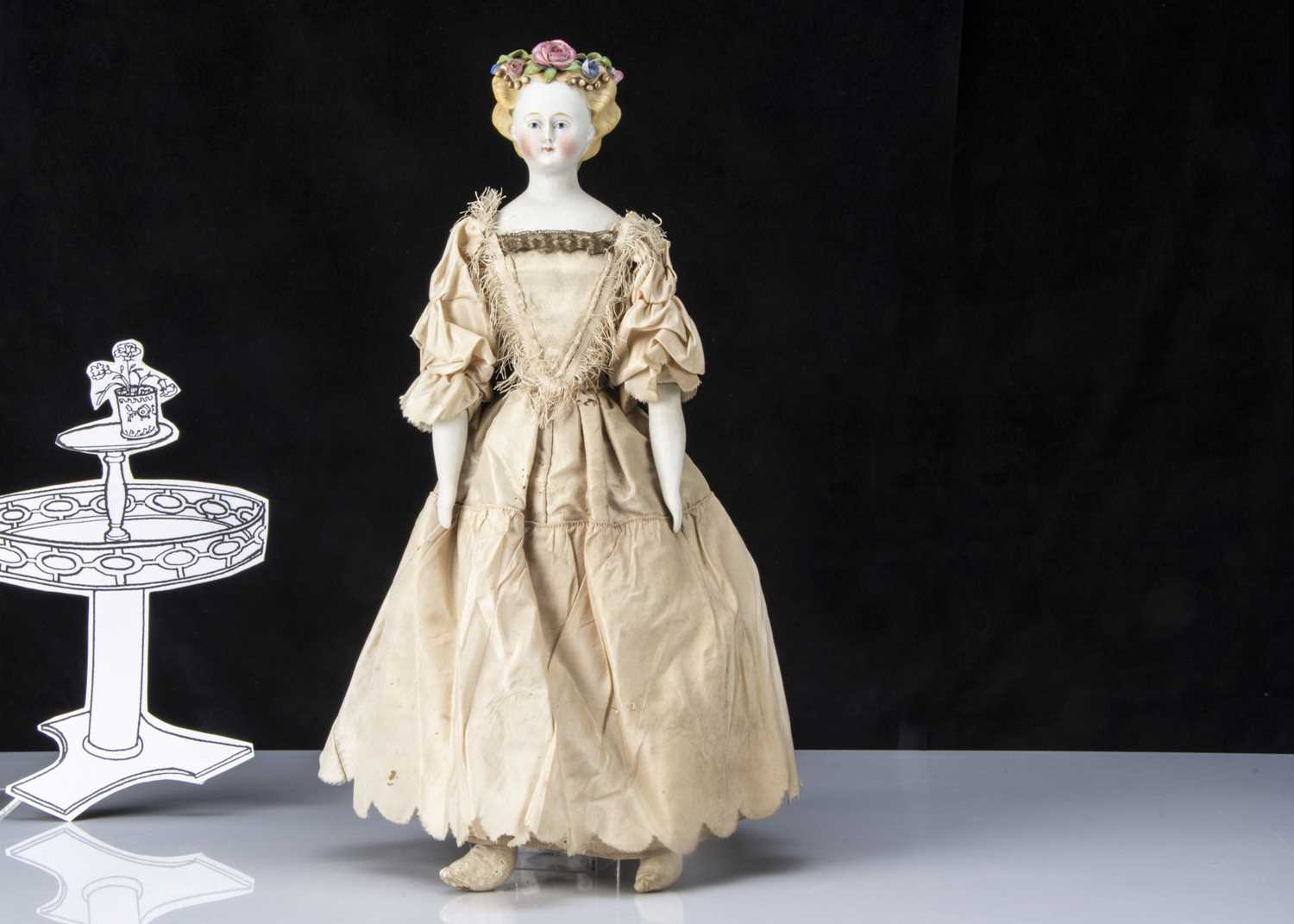 Lot 18 - A fine German bisque shoulder-head lady doll with flowers in hair