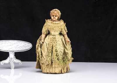 Lot 27 - A small Montanari poured wax shoulder-head child doll