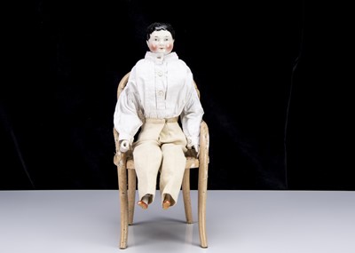 Lot 33 - A rare mid 19th century Kister china shoulder-head boy doll with jointed wooden body