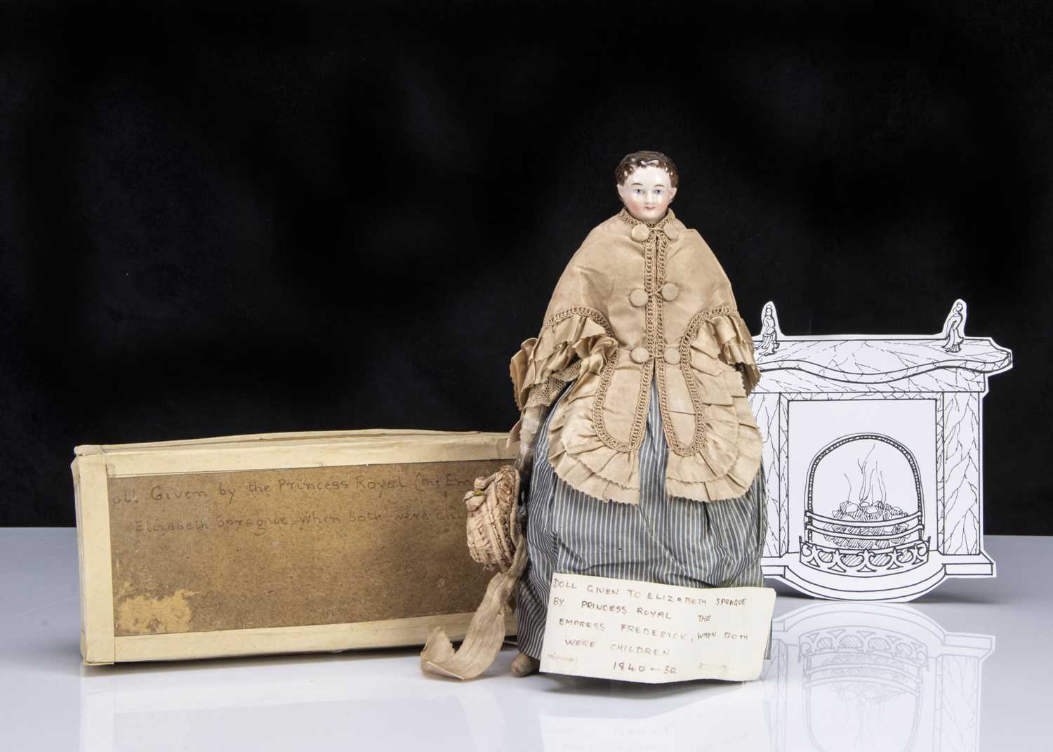 Lot 36 - A rare German mid 19th century pink tinted china shoulder head with Royal provenance