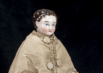 Lot 36 - A rare German mid 19th century pink tinted china shoulder head with Royal provenance