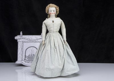 Lot 44 - An unusual German bisque shoulder-head doll with domed head and glass eyes