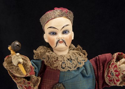 Lot 50 - An unusual bisque headed Chinaman squeak toy