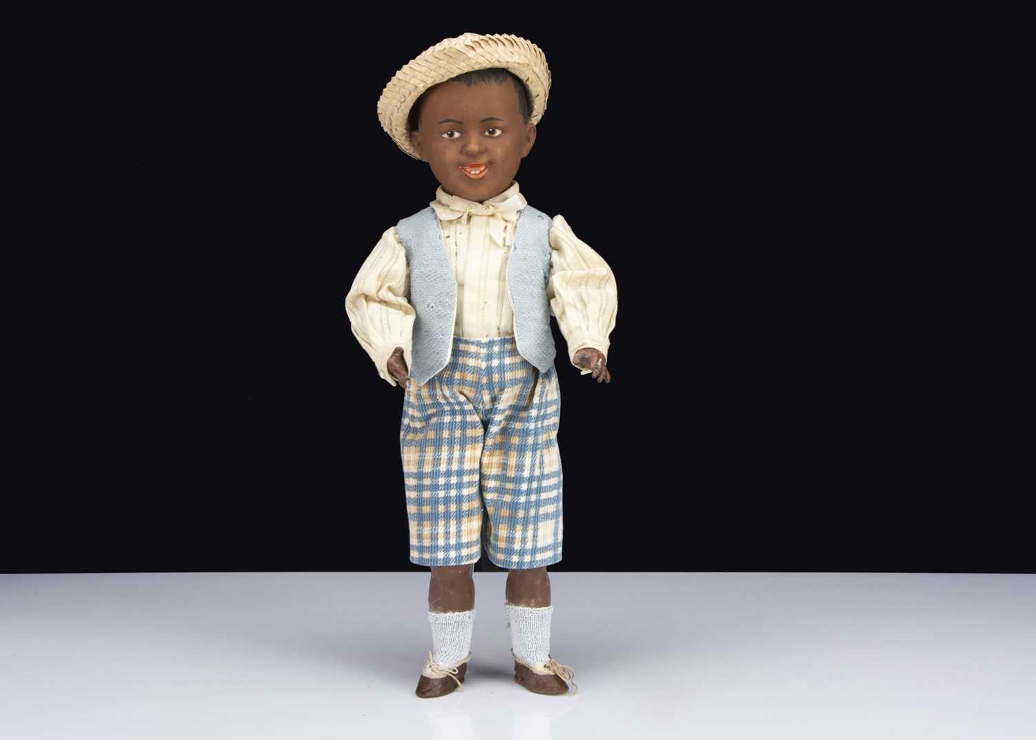 Lot 58 - A rare Gebruder Heubach character smiling black boy