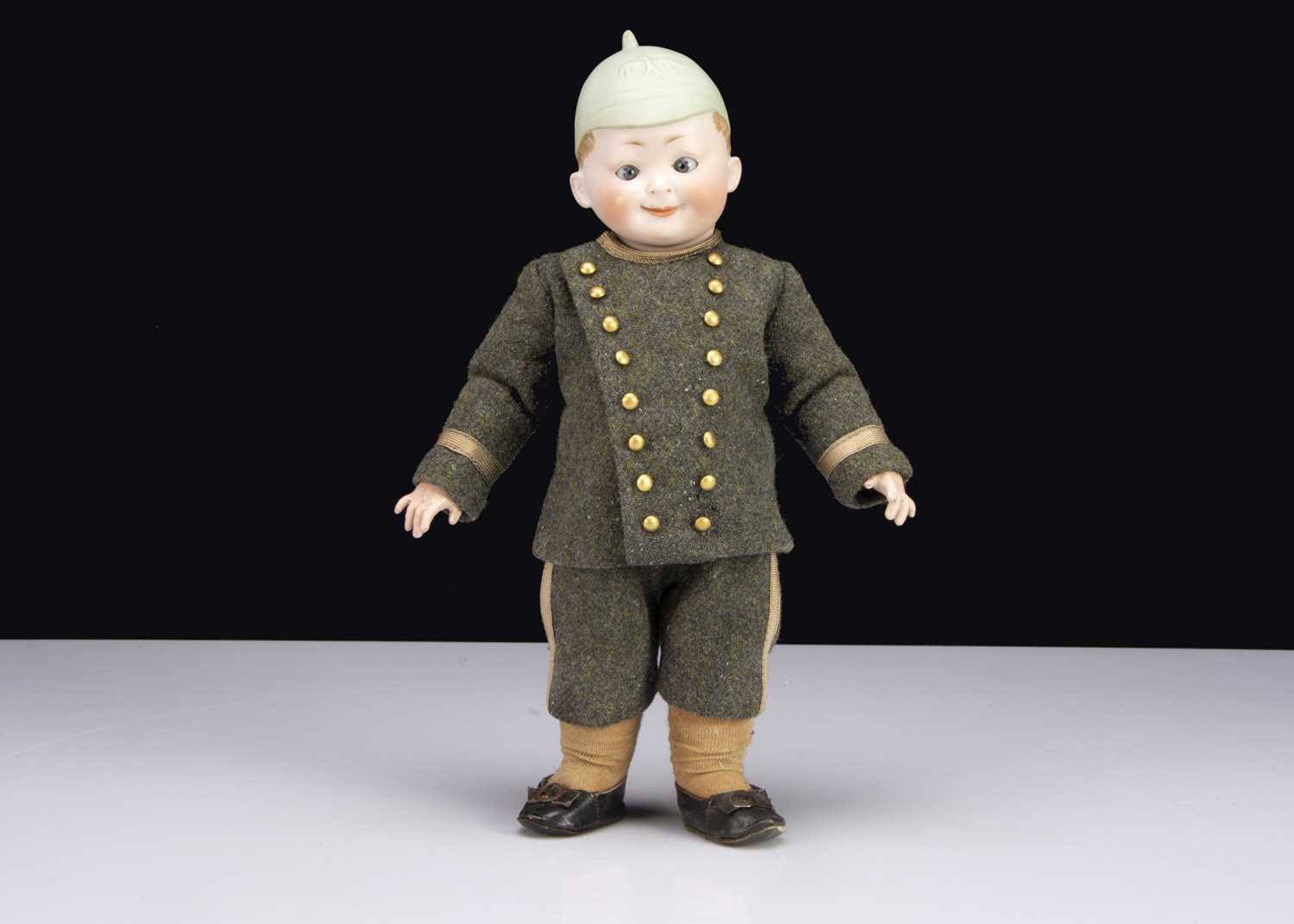 Lot 62 - A rare Max Handwerck bisque headed googly German soldier circa 1915