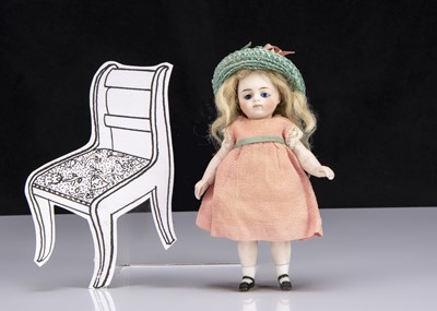 Lot 79 - A Simon & Halbig all-bisque swivel head young child doll