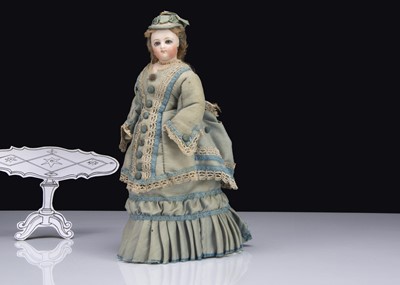 Lot 85 - A small Jumeau swivel headed fashionable doll