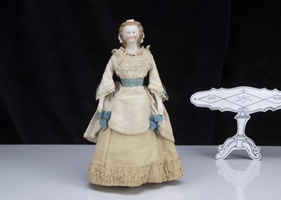 Lot 91 - A rare and fine German bisque shoulder-head doll with net snood