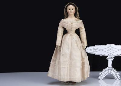 Lot 96 - A French 1840s papier-mache shoulder-head ‘Pauline-type’ doll