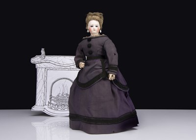 Lot 99 - A rare Pierre Victor Clement pressed bisque swivel head fashionable doll with jointed air-blown leather body