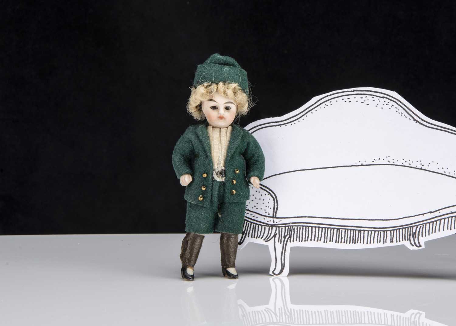 Lot 125 - A German all-bisque boy dolls’ house doll