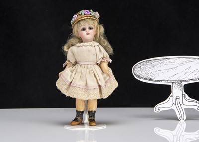 Lot 126 - A German bisque headed dolls’ house doll