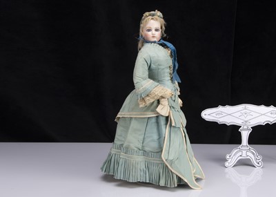 Lot 148 - A large French pressed bisque swivel head fashionable doll