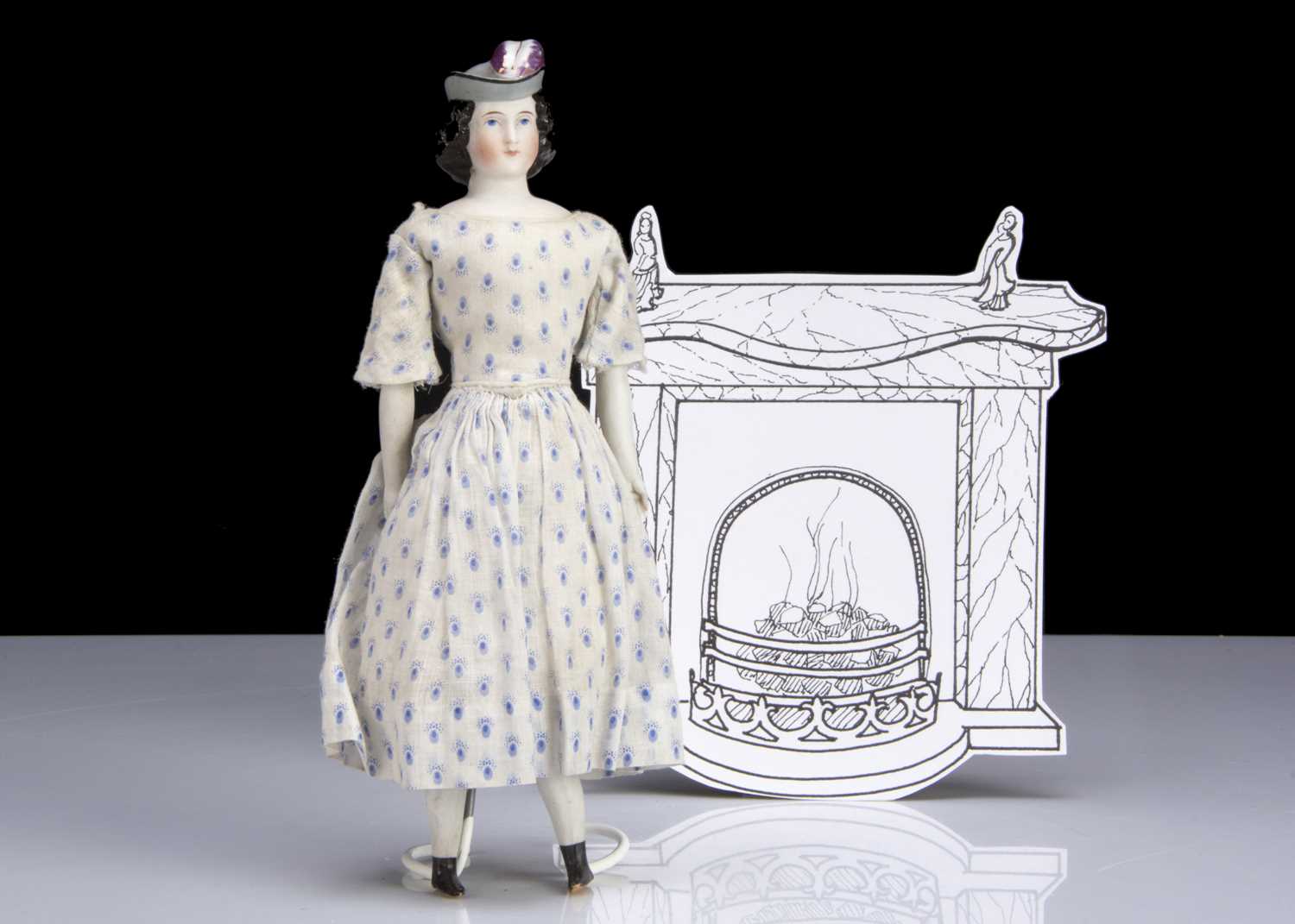 Lot 167 - A rare small 19th century German bisque shoulder-head doll with moulded hat