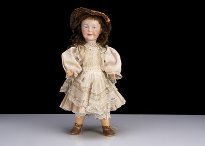 Lot 174 - A rare Armand Marseille painted eye character girl doll circa 1910