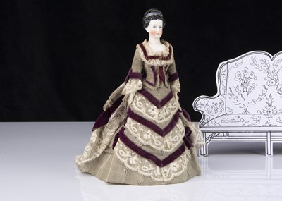 Lot 247 - A German 19th century bisque shoulder-head doll