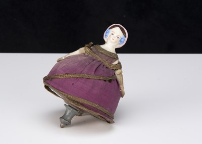 Lot 284 - A French bisque headed Toupie spinning top circa 1900