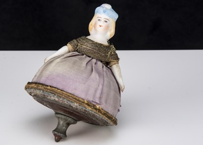 Lot 285 - A French bisque headed Toupie spinning top circa 1900