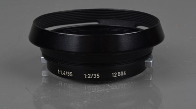 Lot 97 - A Leitz Wetzlar 12 504 35mm f/1.4 - 35mm f/2 Lens Hood
