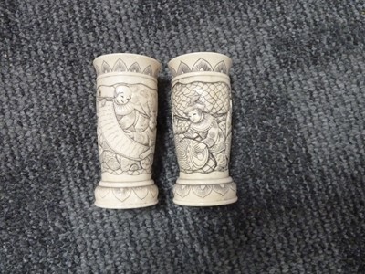 Lot 88 - A pair of Japanese narrow necked ceramic vases