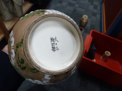 Lot 88 - A pair of Japanese narrow necked ceramic vases