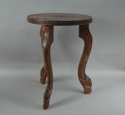 Lot 89 - A small carved hardwood Indian tripod table
